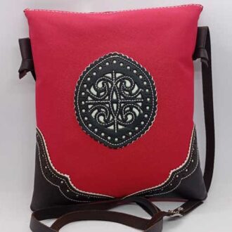 Bandolera lona y piel fucsia.